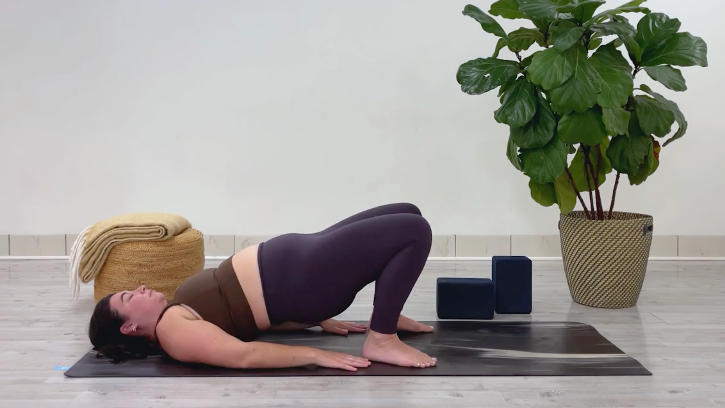 Yoga teacher Taylor Lorenz in Bridge Pose